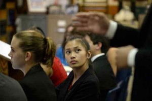 Angelica Garcia, 15, listens to a classmate during a Redlands High School Mock Trial team rehearsal on Tuesday, September 8, 2015 at Redlands High School in Redlands, Ca. (Micah Escamilla/Redlands) 